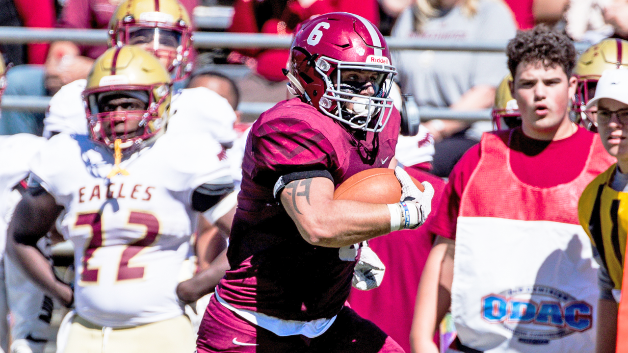 Brendan Weinberg with the ball in his hands during the return of his first career interception against Bridgewater (photo courtesy of H-SC sports information and Keith Lucas at Sideline Media).