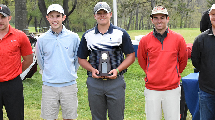 VWC's Evan Cox (center), pictured with W&L's Conley Hurst (to Cox's right), won NCAA Division III Men's Golf Championship individual medalist honors.