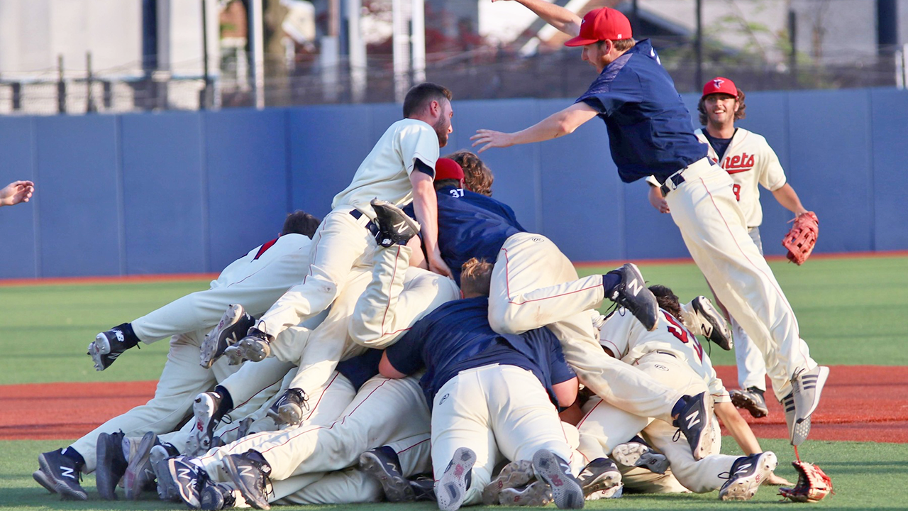 Shenandoah celebrates after winning for the second time on Sunday to advance to the NCAA baseball super regional round.